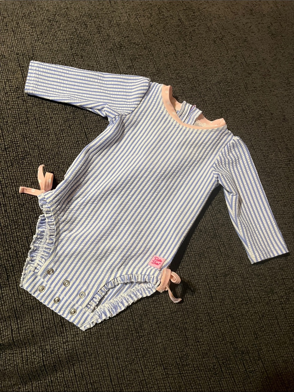 Ruffle butts seersucker rash guard swimsuit